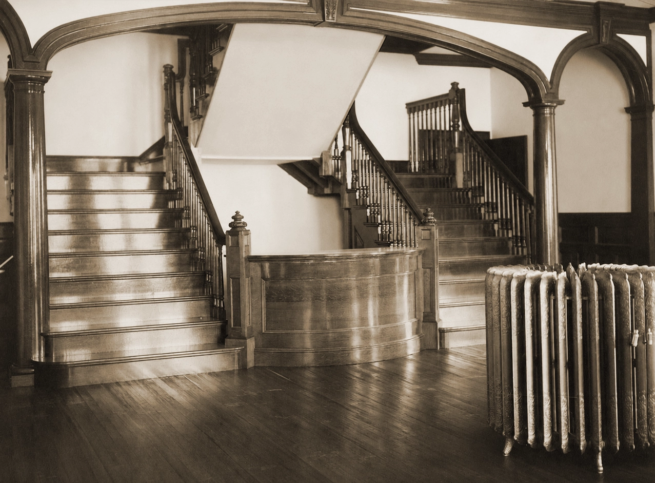 Historic lobby staircase at Idylease