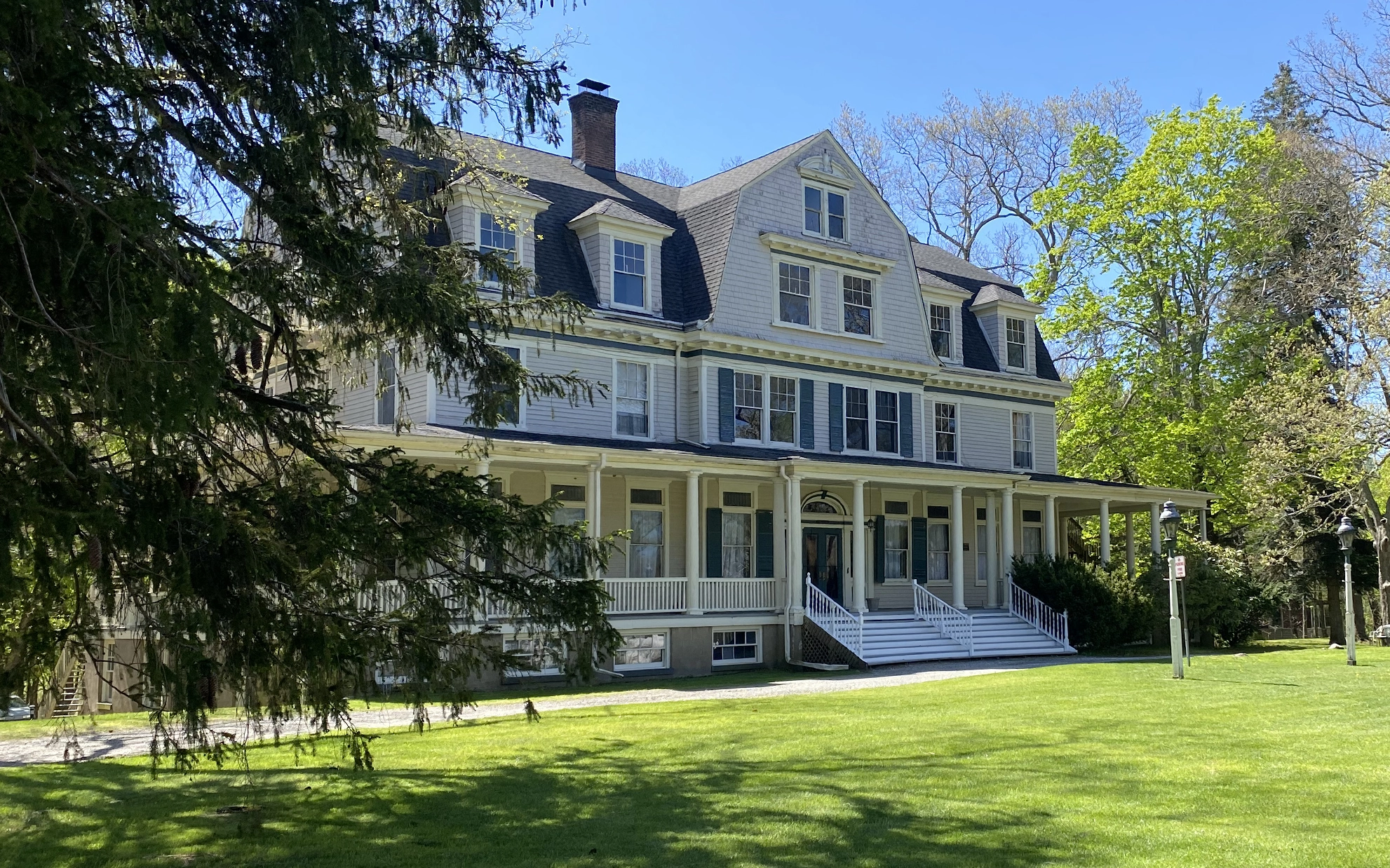 Contemporary exterior view of Idylease and its front lawn in Newfoundland, New Jersey